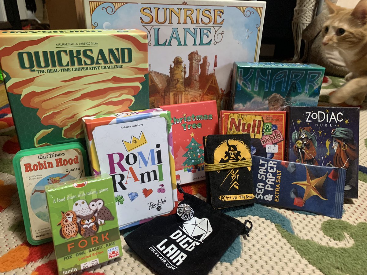 ThingsGetDicey's tweet photo. Dont ask me how I managed to get all this in my suitcase. It required dark rituals made to the Essen Spiel gods… which Shep is seen here attempting to cleanse https://t.co/okn08i2Gg8