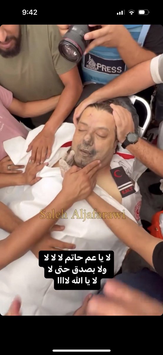 _242H's tweet photo. Paramedic Hatem Awad , angel of humanity. 
 He was brutally and directly targeted by the occupation forces while doing his job
Tell the world, Who is Israel!! 
The most malicious and can only defend itself by killing innocent people!!
#طوفان_الاقصى_ 

 #IsraelPalestineConflict https://t.co/U9N3DZ08Z6