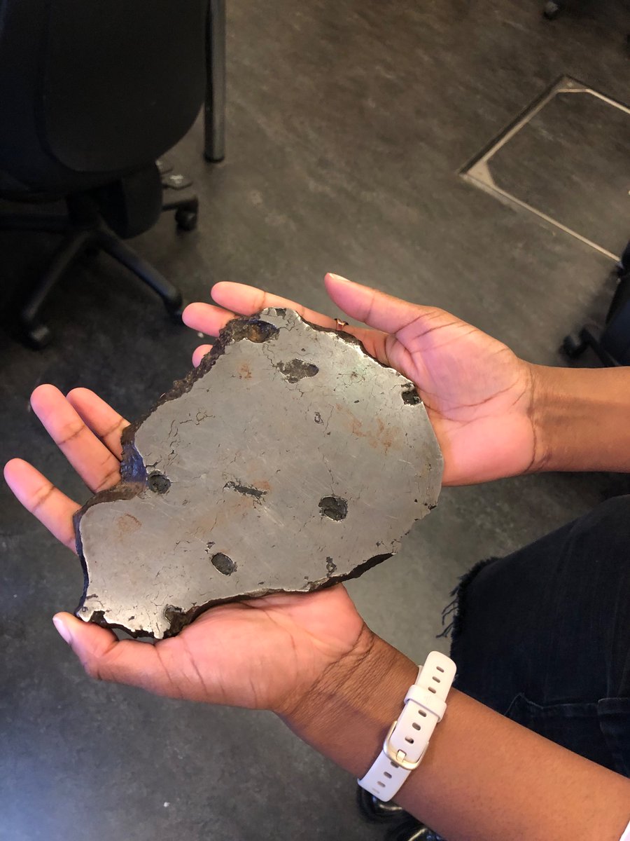I’m holding the core of a planet, and it’s heavy! This is a slice of the Toluca meteorite that fell to earth 10,000 years ago. It was discovered in Mexico in 1776 and later donated to the Royal Institution of Great Britain. It is estimated to be around 4.5 billion years old.