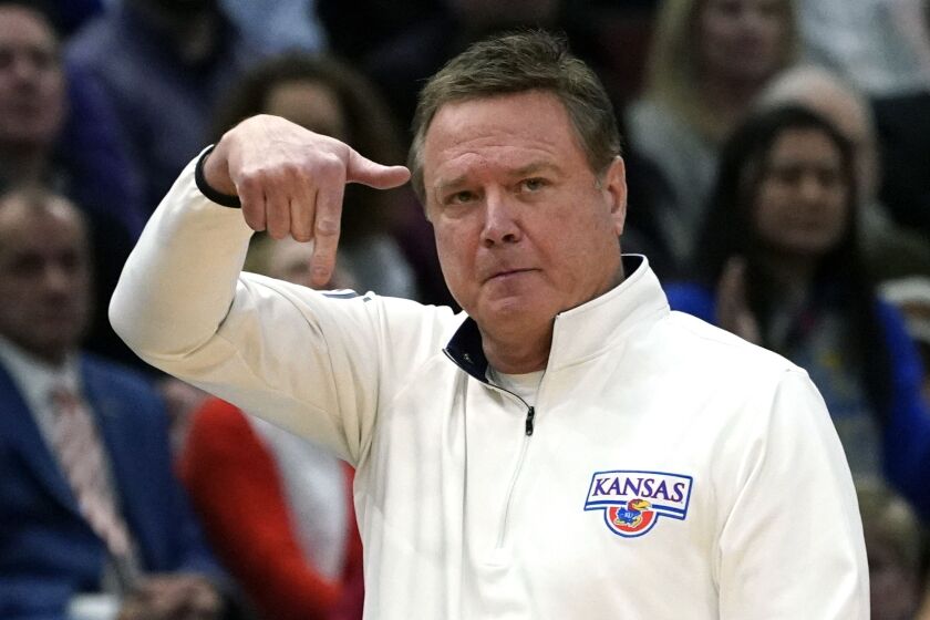 In the shadowed hallways of collegiate basketball, there lies a monster – one of corruption and avarice. Today, it was Kansas men’s basketball that stepped into the harsh spotlight, a byproduct of the sordid 2017 federal probe into the sport. Charged with five Level I violations