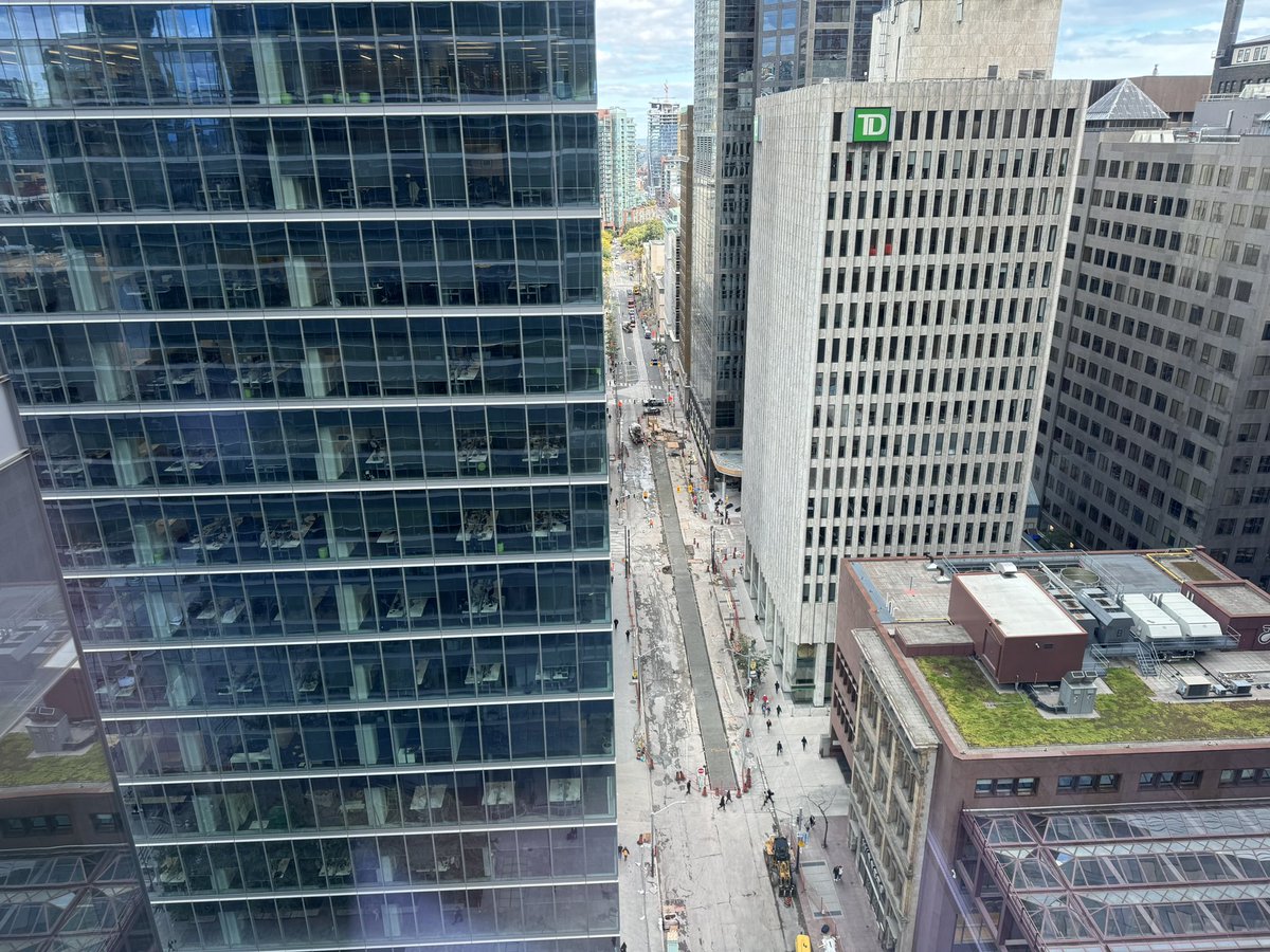 AlexanderGlista's tweet photo. Very cool to see long-abandoned streetcar tracks being rebuilt and re-activated on Adelaide Street in Downtown Toronto. 

These tracks will divert the TTC’s 501 Queen Streetcar during @OntarioLine construction. They’ll also act as a long term redundancy for the network. https://t.co/qWFBJxWAdz