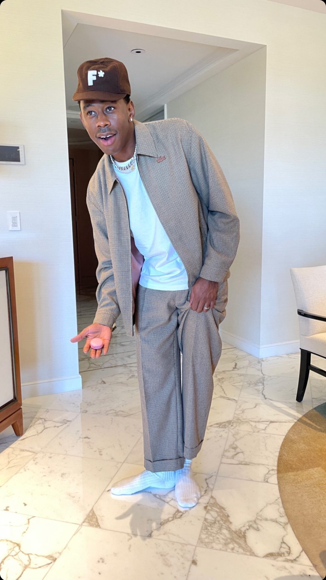 Tyler wearing top golf le fleur