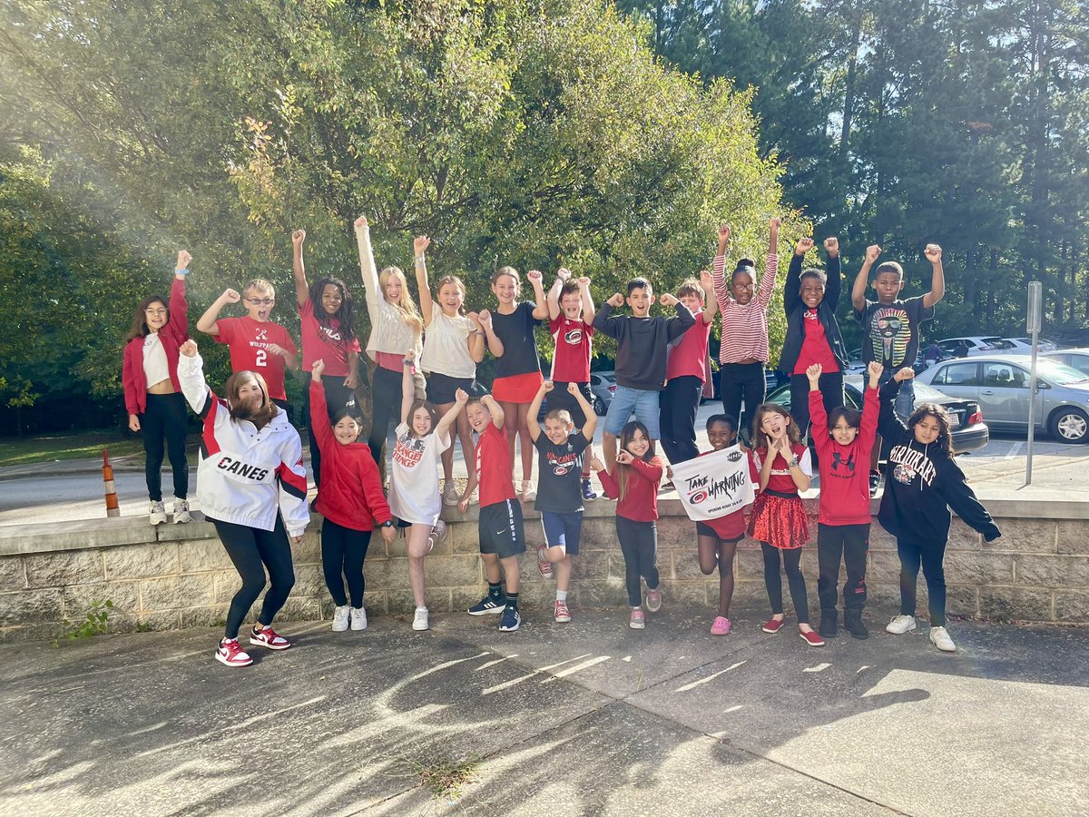 callabug's tweet image. Ms Sherrow’s class bleeds red and black for the CANES!!! #seasonopener #CaniacSmiles ##CauseChaos #LetsGoCanes
