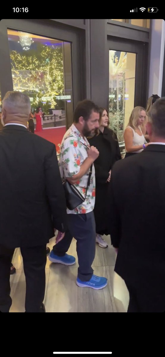 Takemetohannah's tweet photo. ADAM SANDLER?? What’re you doing at the eras tour movie premiere this is amazing @tswifterastour https://t.co/m3F1MSohqd
