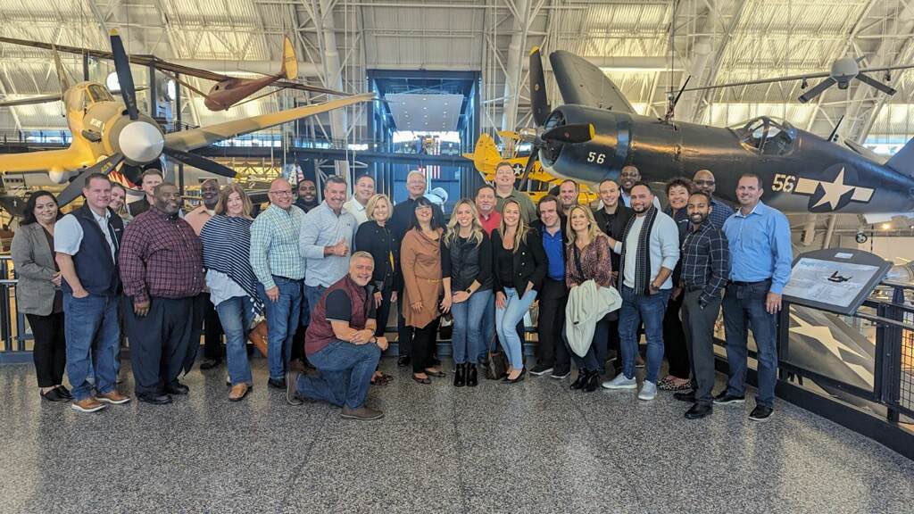 Just a few aviation geeks hanging out with some planes.