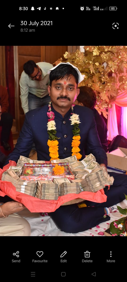 A UP police sub-inspector Shashank Mishra posted in Jhansi had allegedly shot at his pregnant wife multiple times following dispute. Wife claimed her in-laws have been harrassing her for dowry. A picture of Shashank Mishra's Tilak ceremony held in 2021 has also surfaced.