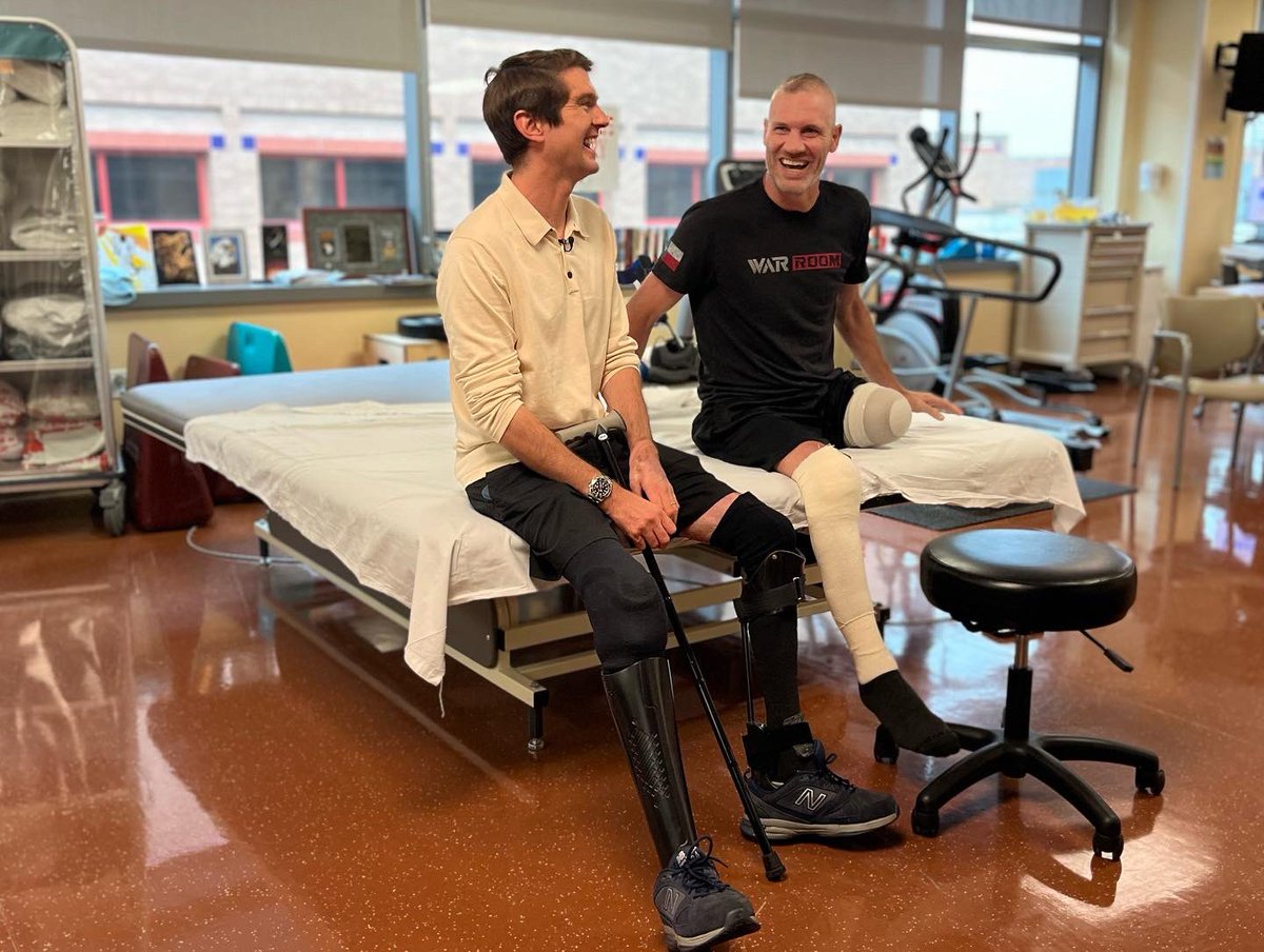 BenjaminHallFNC's tweet photo. Back at Brooke Army Medical Centre, Texas. Reunited with all the doctors, nurses, physios who saved me. Thank you. They’re heroes. @bamc_official https://t.co/3WO4kVNQdo