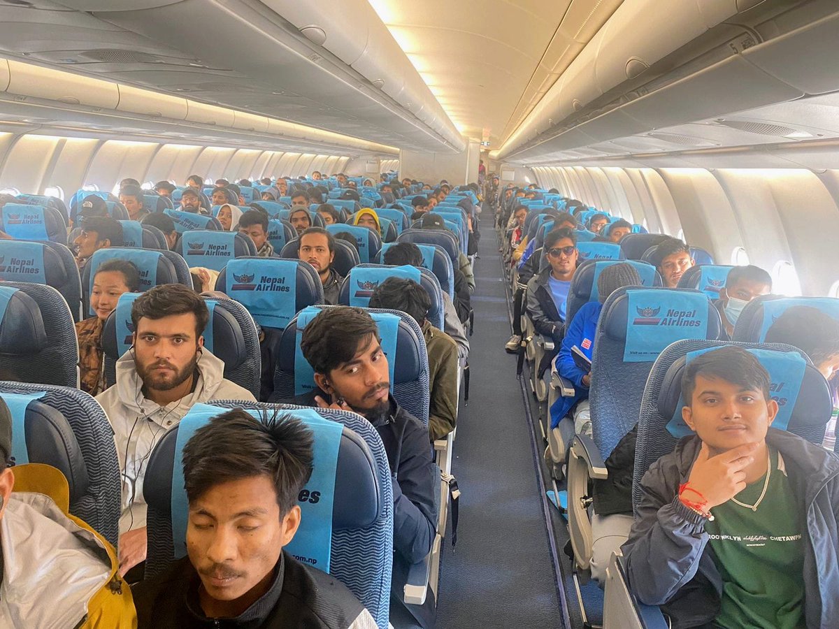 MofaNepal's tweet photo. Total 253 Nepali students board the rescue flight of Nepal Airlines. Foreign Minister Hon @NPSaudnc greets the students in the aircraft, which is taking off from Ben Gurion Airport Tel Aviv shortly.

@PaudyalBR 
@sewa_lamsal https://t.co/BPrsNh54NS