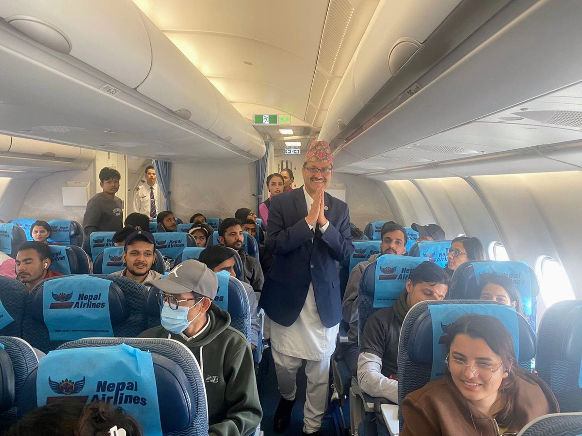 MofaNepal's tweet photo. Total 253 Nepali students board the rescue flight of Nepal Airlines. Foreign Minister Hon @NPSaudnc greets the students in the aircraft, which is taking off from Ben Gurion Airport Tel Aviv shortly.

@PaudyalBR 
@sewa_lamsal https://t.co/BPrsNh54NS