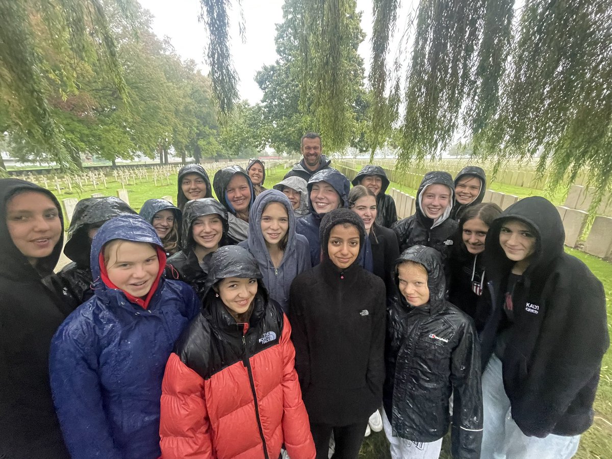 Head_WHS's tweet photo. It’s raining just a little here in Belgium on the Battlefields trip…but we’re learning and commemorating, and smiling through the torrent @WimbledonHigh @History_WHS @gdst https://t.co/bdiulWSHsF