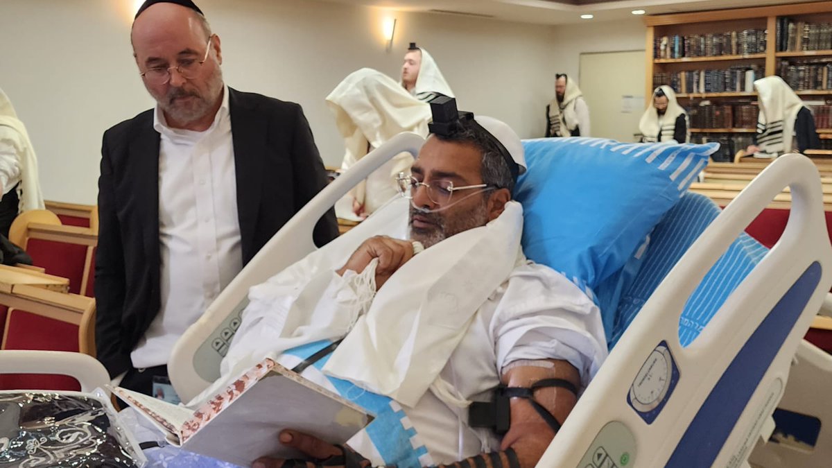 Amidst Israel's ongoing tragedies, a wounded man celebrates his son's Bar Mitzvah at Sheba. Yitzhak Shniker, saved by family, marks the occasion in the hospital's synagogue. 'People we don’t even know came to join in the celebration,' said his wife, Meital Shniker-Swisa.