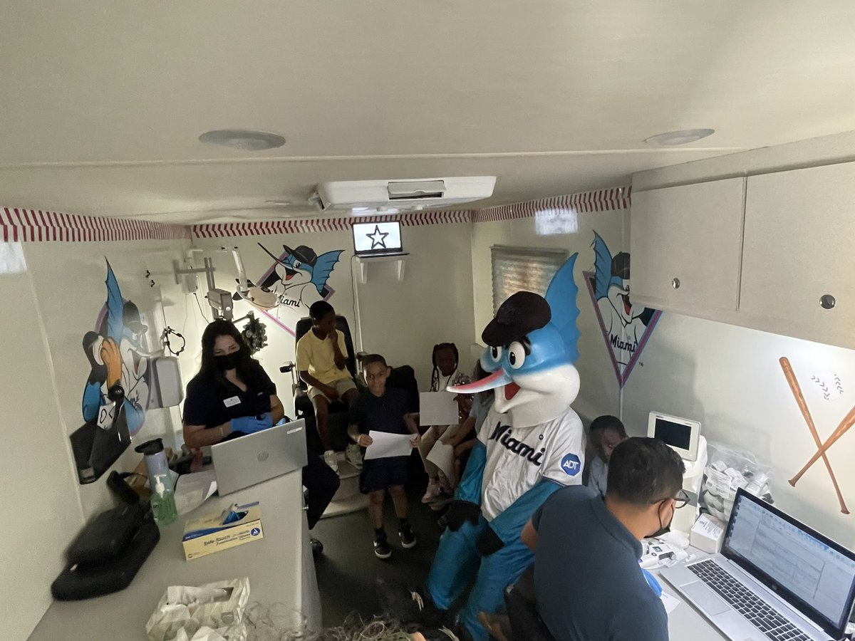 JonErikAlvarez's tweet photo. The @Marlins and @Miamilighthouse are at Lenora B. Smith Elementary today, offering free eye exams and glasses to students, as part of the Florida Heiken Children’s Vision Program. Billy The Marlin stopped by to surprise the students and have some fun. @MDCPS https://t.co/XLGgtFKlIr