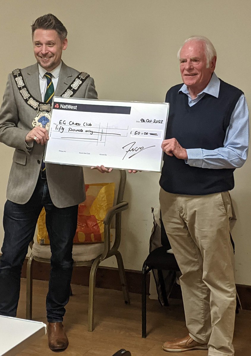 EGChessClub's tweet photo. East Grinstead Chess Club now has a memorial tournament named after one of the club's founders. The Sir Patrick Moore Trophy is open to non-club members and runs annually. On the 9th October Mayor Cllr Frazer Visser presented the club with a cheque for £50 towards the tournament. https://t.co/wXYxdMsAry