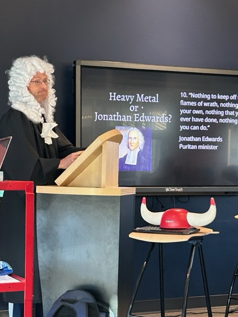 Bill Bryant channels Jonathan Edwards as he &amp; Katie Bryant show the Integrated Studies students the rhetorical feat that is "Sinner's in the Hands of an Angry God." Earlier, students guessed whether quotes were from heavy metal bands or the fiery revivalist himself. #GoBJHS