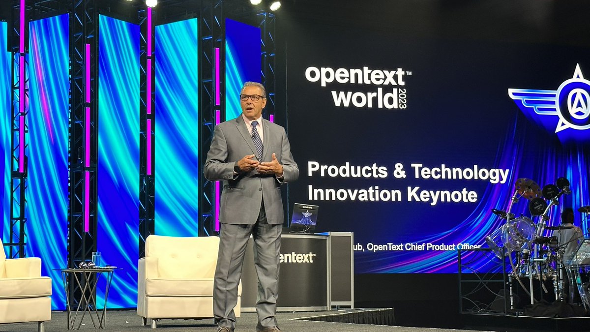 rwang0's tweet image. MyPOV: @OpenText @MuhiSMajzoub takes stage. The future is so bright he’s got shades. 

#opentextworld