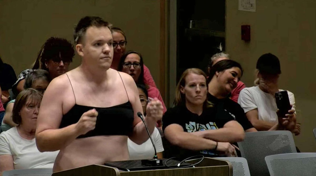 Can't unsee this: An Arizona father stripped down to a crop top and short shorts at a school board meeting to protest a proposed dress code that would allow tank tops and students showing their midriff. Ira Latham was among several parents at Higley Unified School District's