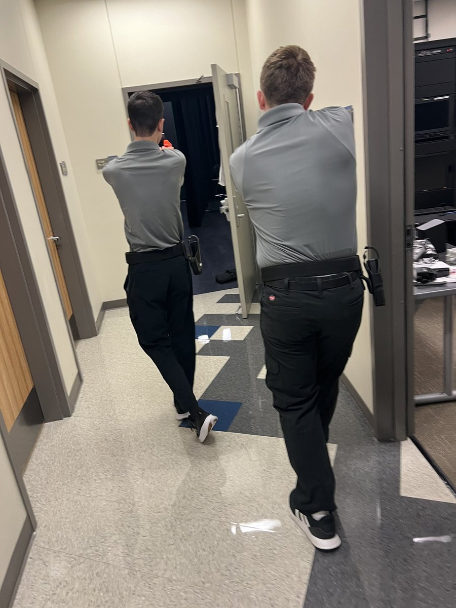 JRittmueller's tweet photo. From classroom to crime scene! ๐ Our law enforcement students working in unison during building-clearing simulations. A testament to the innovative training led by our dedicated teacher! #FutureProtectors #TeamworkInAction #HCTCReady @CtcHollenstein @EMSISD @EMSISD_CTE https://t.co/jeDOazVS54