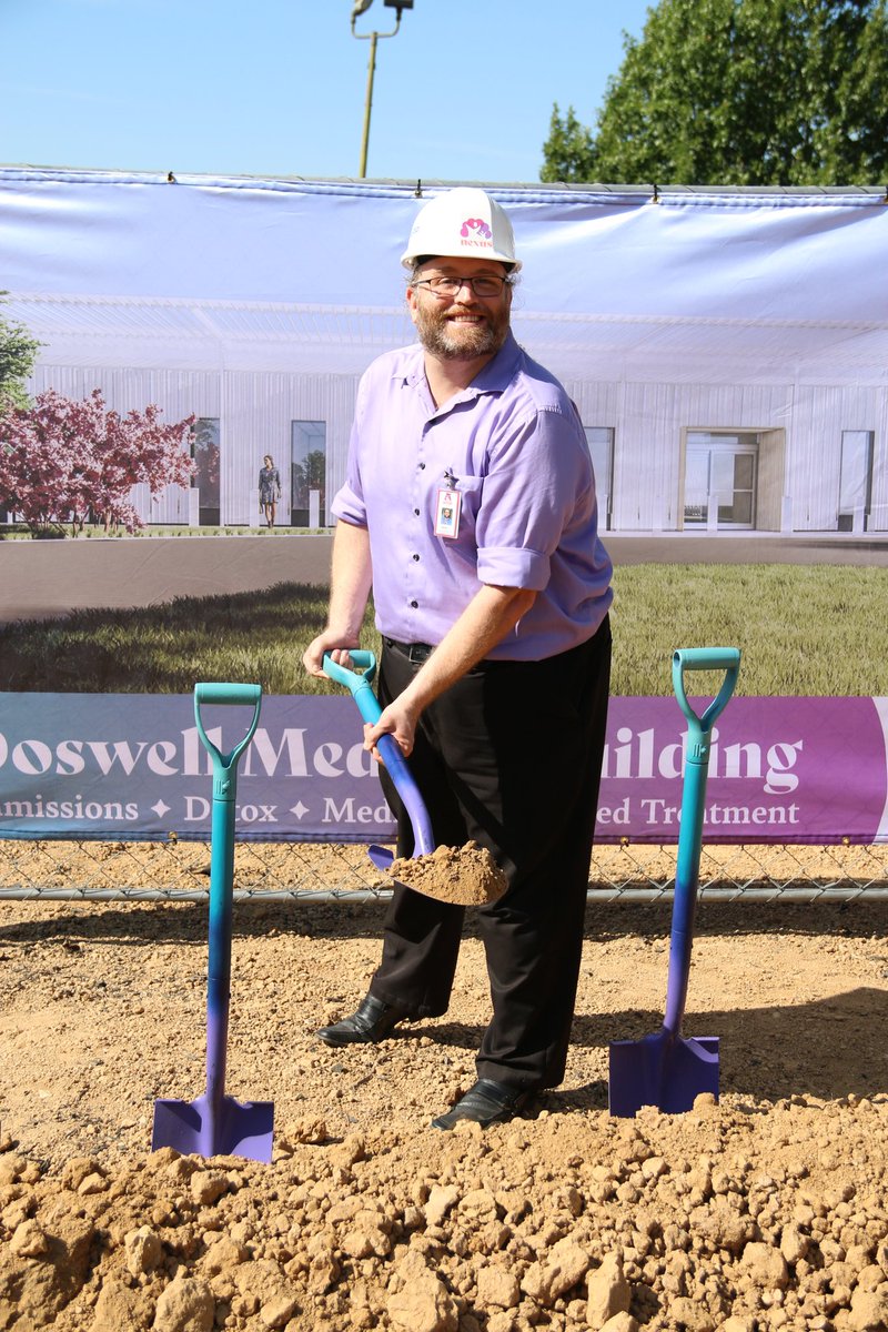 Breaking ground on <a href="/NexusRecovery/">Nexus Family Recovery Center</a>'s new building last week! I also designed the banner behind me and suggested the color scheme for the shovels!