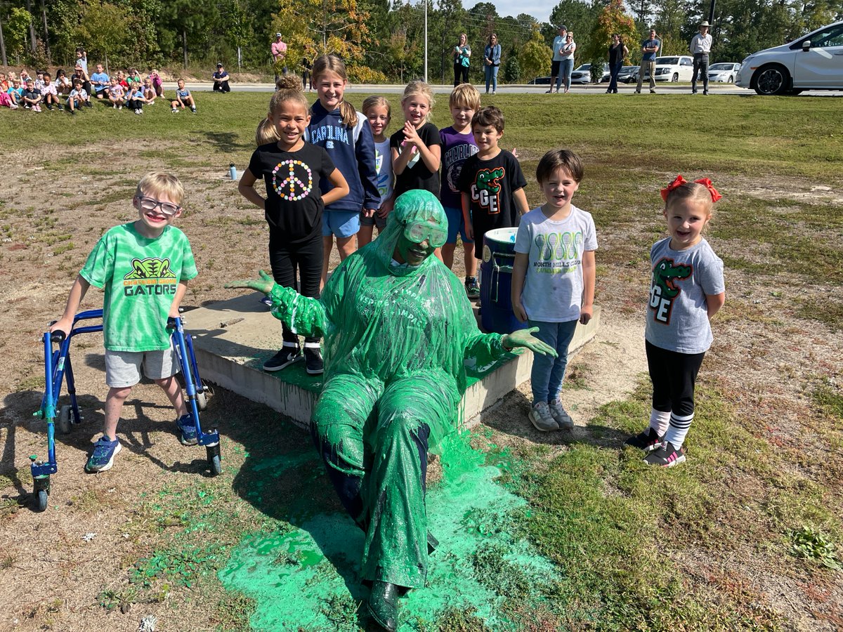 ChathamCoSch's tweet photo. The students at Chatham Grove Elementary hit their Boosterthon goal, and voted to "slime" Principal @DrCGEGator today! #OneChatham #CGEGators https://t.co/oBjs8G8Ykd