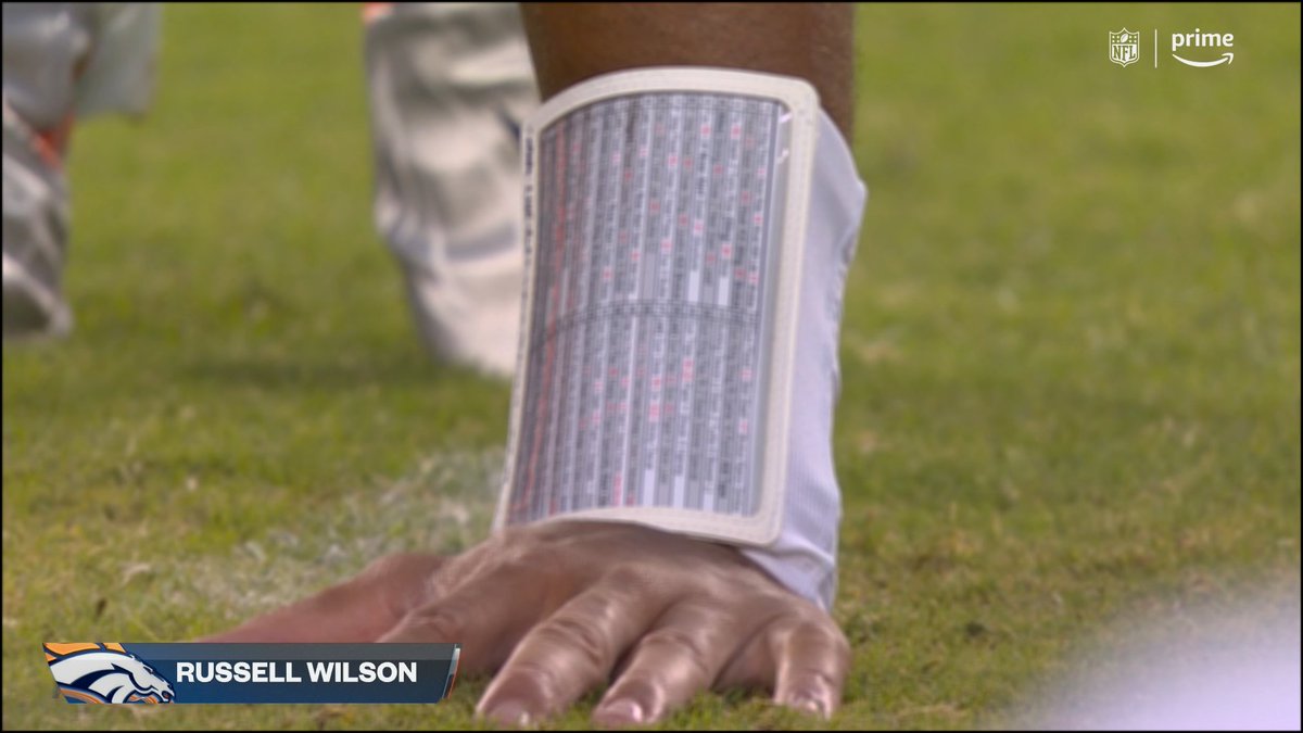 NFLonPrime's tweet image. Russell Wilson has an encyclopedia on his wrist 👀