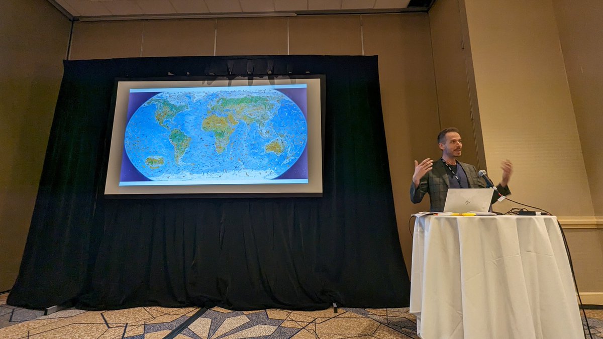 Lovely to catch up with <a href="/AntonThomasMaps/">Anton Thomas</a> after his 3yr odyssey making 'Wild World'. His talks are always so enthusiastic. Might be because he locks himself away for extended periods, then has all this excitement to share! Either way, great #nacis2023 presentation today.