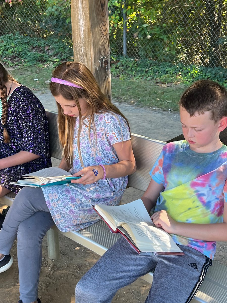 MsFearrington's tweet photo. It was the perfect weather today to sit outside and read ☀️📚 https://t.co/TgDUYYtKLS
