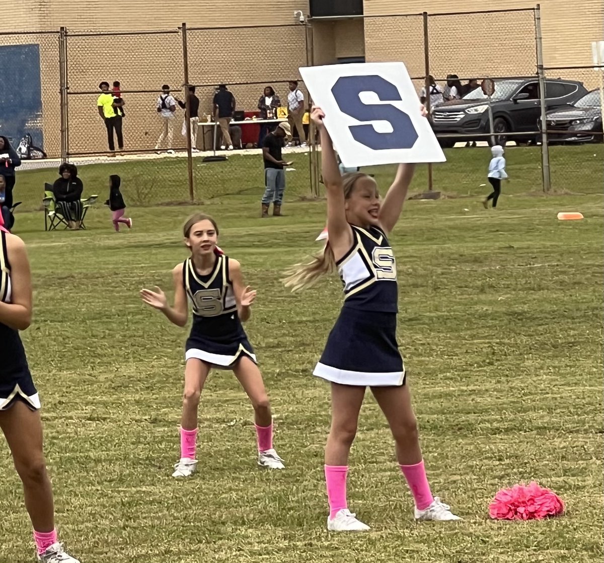 Semmes Middle School cheerleaders performing at halftime of the Semmes vs Pillans playoff football game. #AimForExcellence #TeamMCPSS #LearningLeading