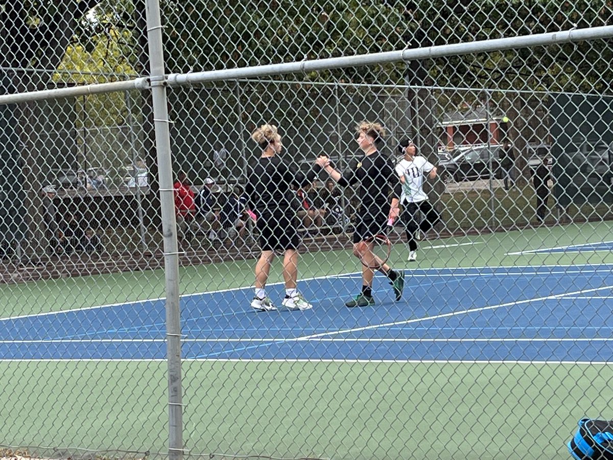 LogemanDiane's tweet photo. Some people dream of meeting their favorite player- I raised mine- “My Necklace” State tennis today and last match together for the Logebros @OPS_Burke.💛🥲🖤#OPSProud #Joy https://t.co/J5jGMuoOO8