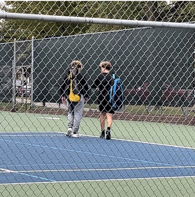 LogemanDiane's tweet photo. Some people dream of meeting their favorite player- I raised mine- “My Necklace” State tennis today and last match together for the Logebros @OPS_Burke.💛🥲🖤#OPSProud #Joy https://t.co/J5jGMuoOO8
