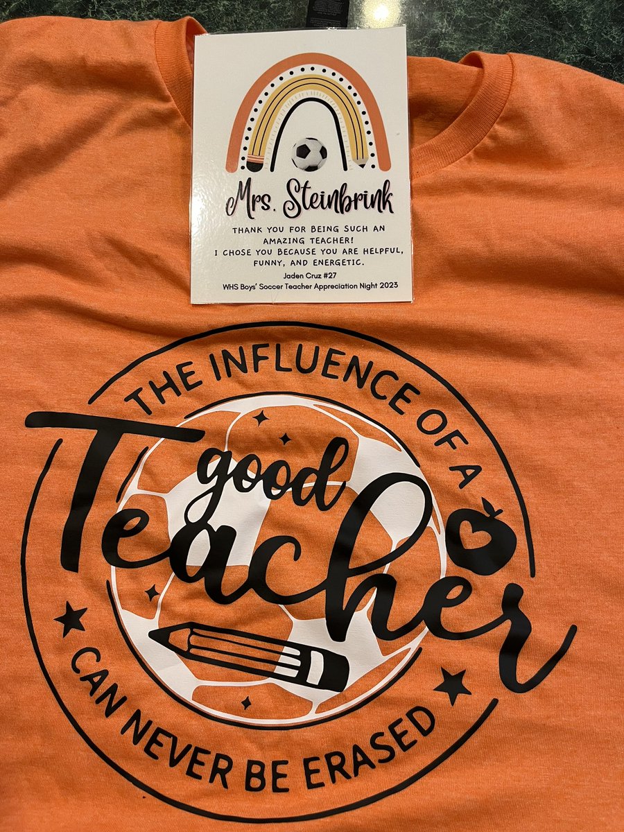 SteinbrinkLaura's tweet photo. How cool! 🧡My HS’s soccer ⚽️ team has a teacher night where each athlete & the T they nominated line up with them during the varsity intros. They gave us a goody bag with a shirt, candy, and a nice laminated card! At halftime, we Ts attempted a penalty kick & I “scored” a goal! 🥅 (My student pretended it got by him. 😂)