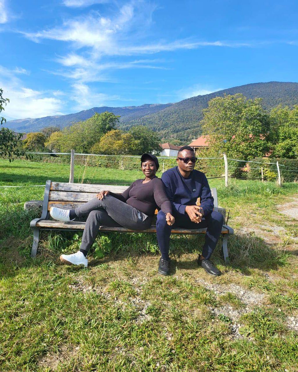 It's a new day--literally!

We spread out under the morning sun like petals,  basking as we marinate in the mix of grace &amp; mercy. 

The Omoge's frame lovingly rests on mine, like the blue sky does on the sprawling hill behind us. 

Her smile brightens with the same intensity of