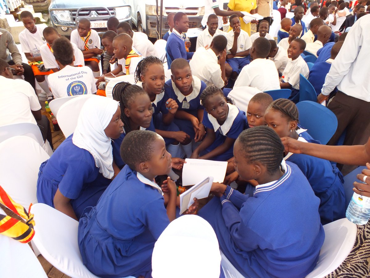 TMFUganda's tweet photo. Students from across Kampala currently engaged in a lively discussion, sharing the challenges they encounter while pursuing a quality education.  They've grouped up, moving around to exchange thoughts and ideas at the event. 🧠💡 #IDGC2023 #IDGC23UG https://t.co/t6Bic2rFDn