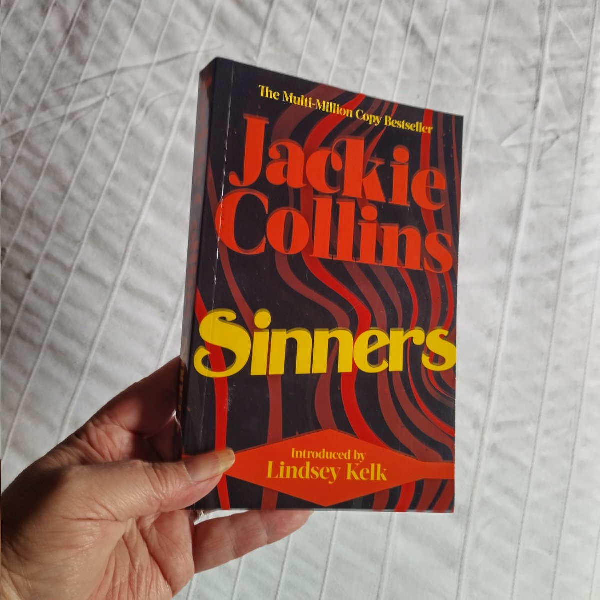BookMinxSJV's tweet photo. Finished copies of the brand new paperback edition of @jackiejcollins #Sinners, featuring a new introduction by @LindseyKelk have arrived, and look total 🔥!

Out in all good #ChooseBookshops 23rd November.

#BeMoreJackie. 

https://t.co/AwVyvmaieG https://t.co/bpFbQfRT5p