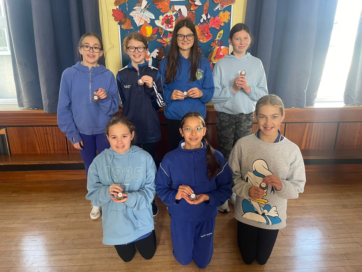 ScoilAngela's tweet photo. Our cross country athletes were delighted to be presented with their bronze team medals  from the recent Primary School Cross Country competition today at our assembly. Well done to you all👏🏅🏃‍♀️ https://t.co/8dj4Qgr6kj