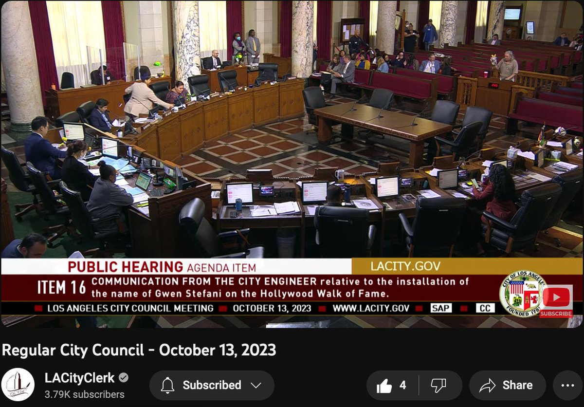 ZacharyObama's tweet image. Wayne Spindler at the mic with the goat puppet. This is normal in Los Angeles, I'm not sure what exactly other city councils don't have #profane #puppeteers, but it kinda offsets the simply racist harsh crazy commenters. At least Spindler makes effective fun of the Council. #News
