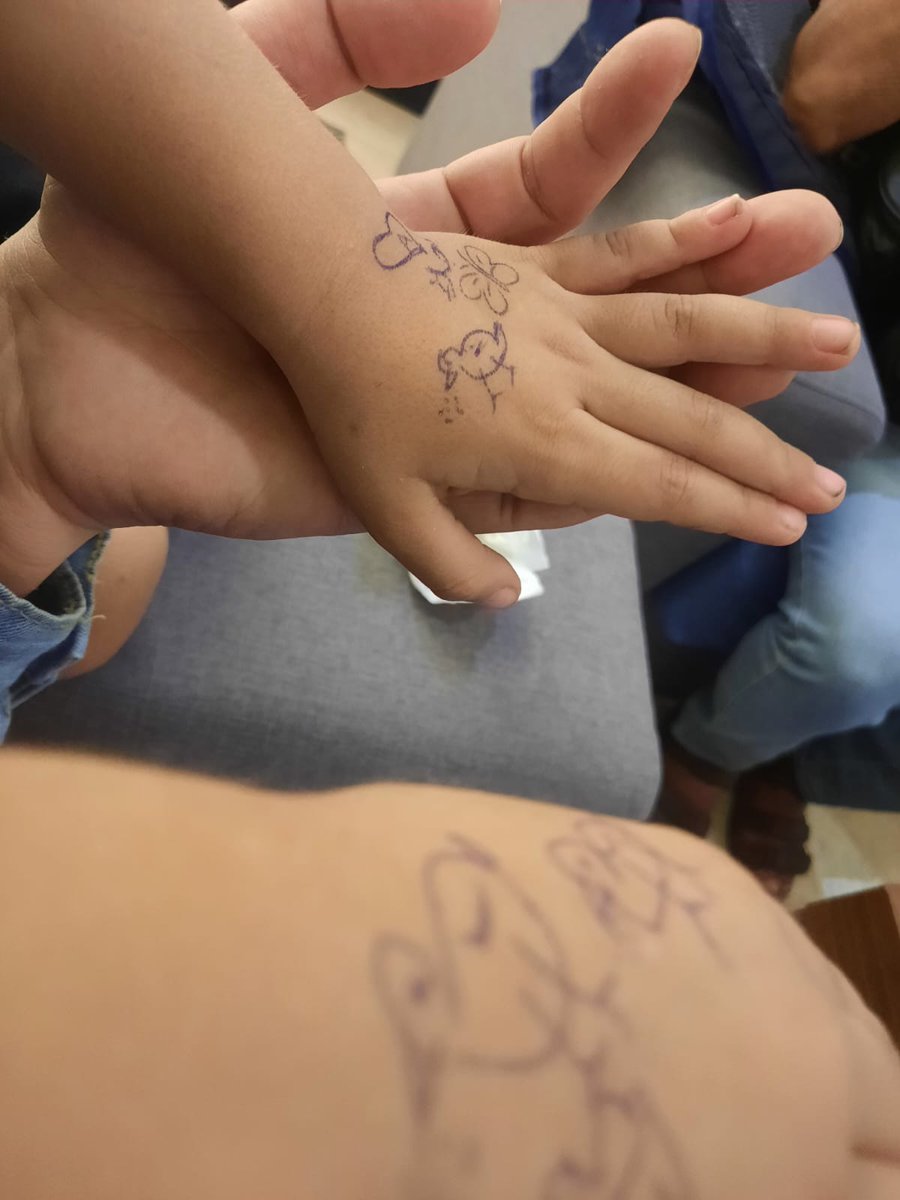 While sheltering in the basement amid Israeli airstrikes on Gaza City, @nytimes freelance journalist Ameera Harouda drew birds and butterflies on the hands of her 3-year-old son Taim to try to keep him calm. 'Draw food for them too so the birds can eat,' Taim told his mom. #Gaza