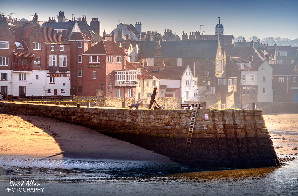 Tate Hill Pier in the North Yorkshire coastal town of Whitby. Just beyond lie the 199 steps that lead up to the historic 12th century Church of St Mary... @VisitWhitby @thewhitbyguide @Welcome2Yorks @NorthYorkMoors @NorthEastTweets @VisitEngland @VisitBritain @bramstoker