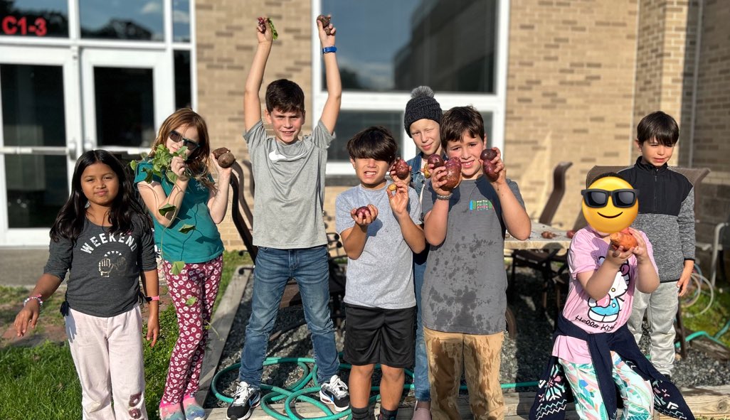 Our Garden Club reaps the fruits of their labors - potatoes, radishes and lettuce!