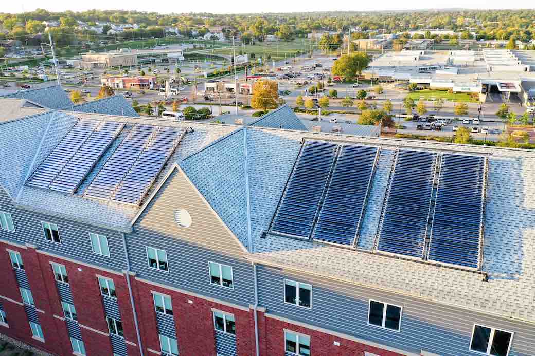 PresHendrickson's tweet photo. This week we celebrated an exciting partnership with @ELMCompanies and @NakedEnergyLtd officially debuting the innovative VirtuHotHD solar thermal collectors in our Graves Hall Residence for first-year students, continuing our care for our common home. https://t.co/UibYsoLbkA https://t.co/QzryttqQLt