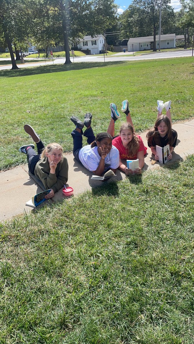 A little windy but 6th hour earned outside reading. #lovetoread #friYAY @AntiochMS  @NKCSchools