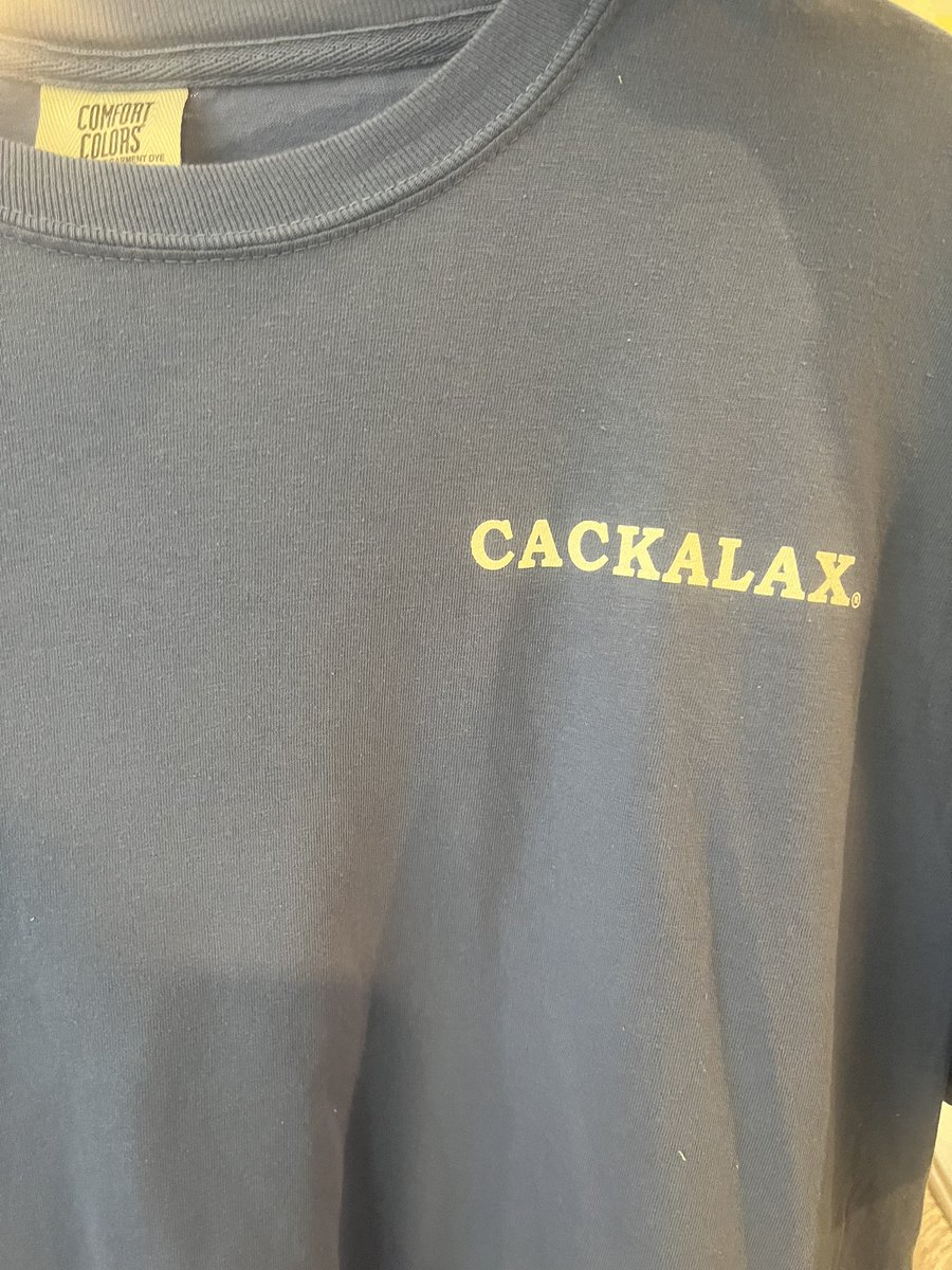Heading to @nclaxfest tomorrow in Goldsboro? You can see some new Cackalax stuff: new hoodies in military green and grey, as well as a light blue crew sweatshirt. We also have new t-shirts and royal blue Comfort Colors shirts — in addition to our usual offerings. See you there!