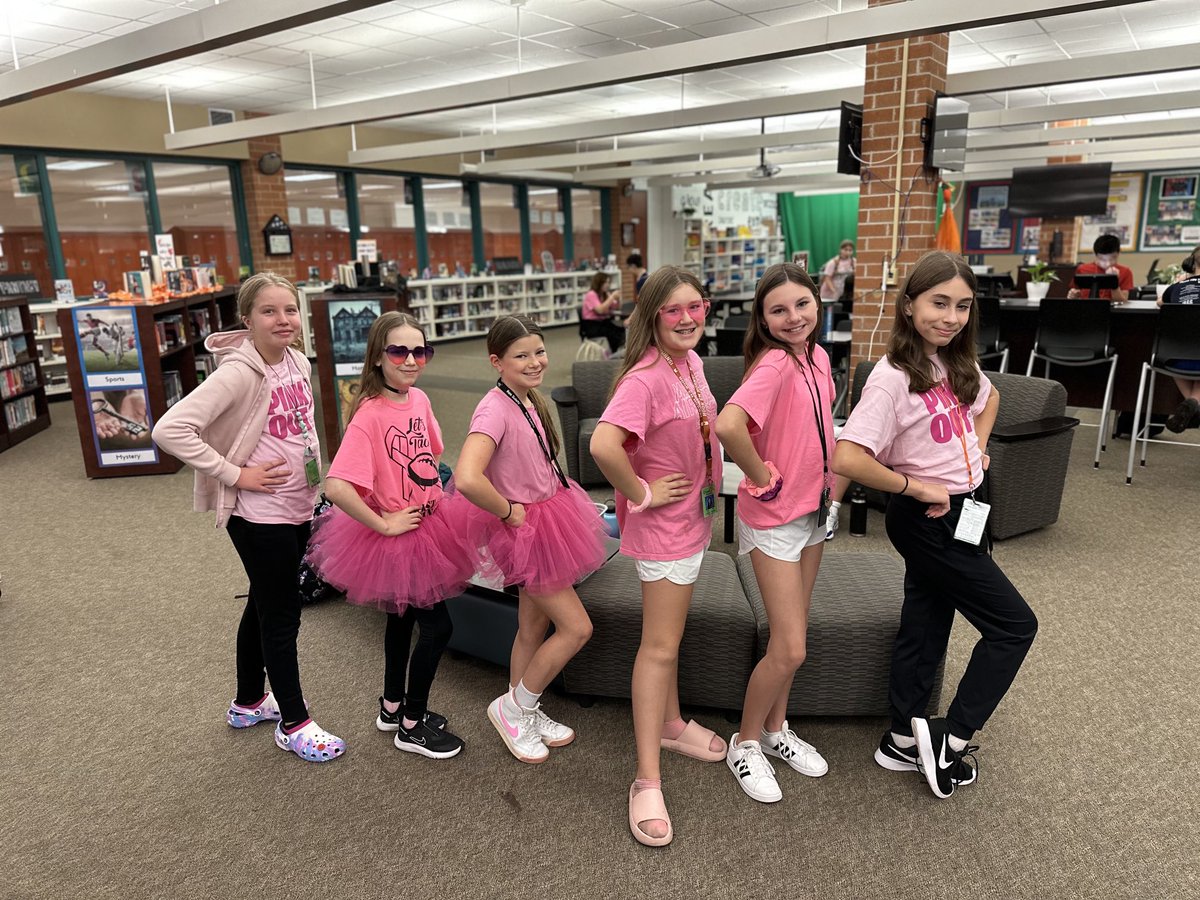 Pink out day is rosy and bright in the RMS library today as we support Breast Cancer Awareness month!  #REPhard ⁦@HumbleISD_RMS⁩