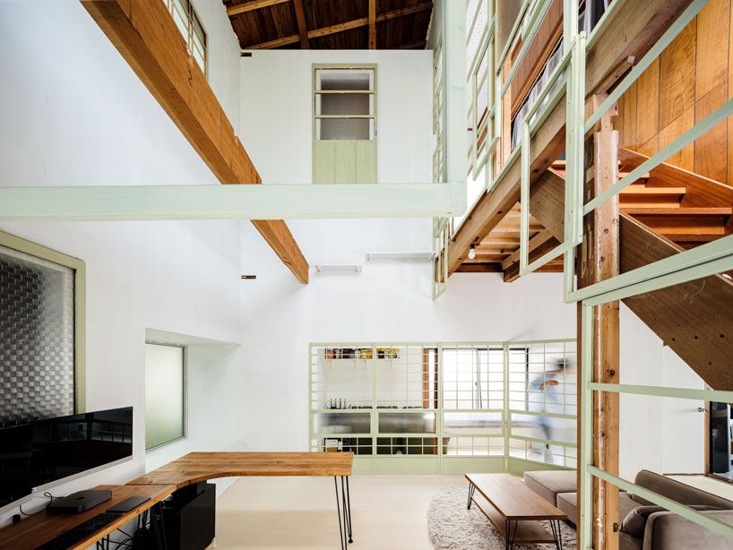 designboom's tweet image. repurposed #windowframes in green pastel add a splash of brightness to OTA's #house in japan