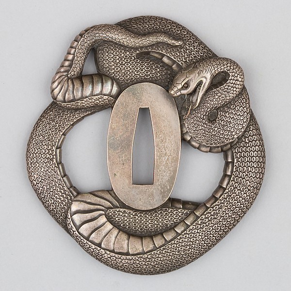 Sword guard (tsuba: silver, copper, 138.9 g) in a shape of a snake, Japan, c. 1615–1868.