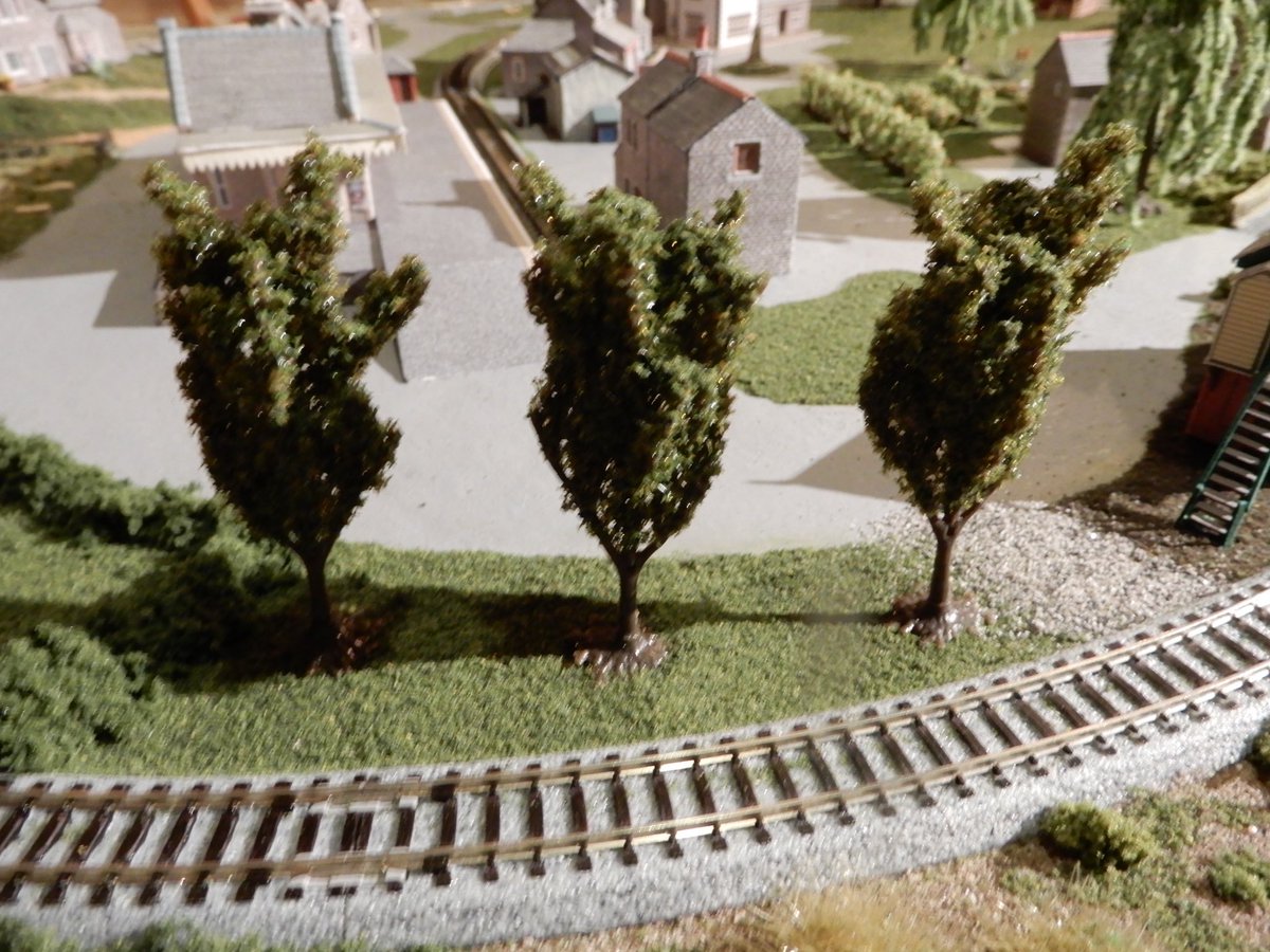 Matedwards7's tweet image. Working on my n scale Thomas the Tank Engine layout again tonight. Added some more trees. I haven’t done it here but a trick often employed by model railway enthusiasts is to have the smaller trees at the back of the layout to give a sense of distance. #modeltrains #modelrailways