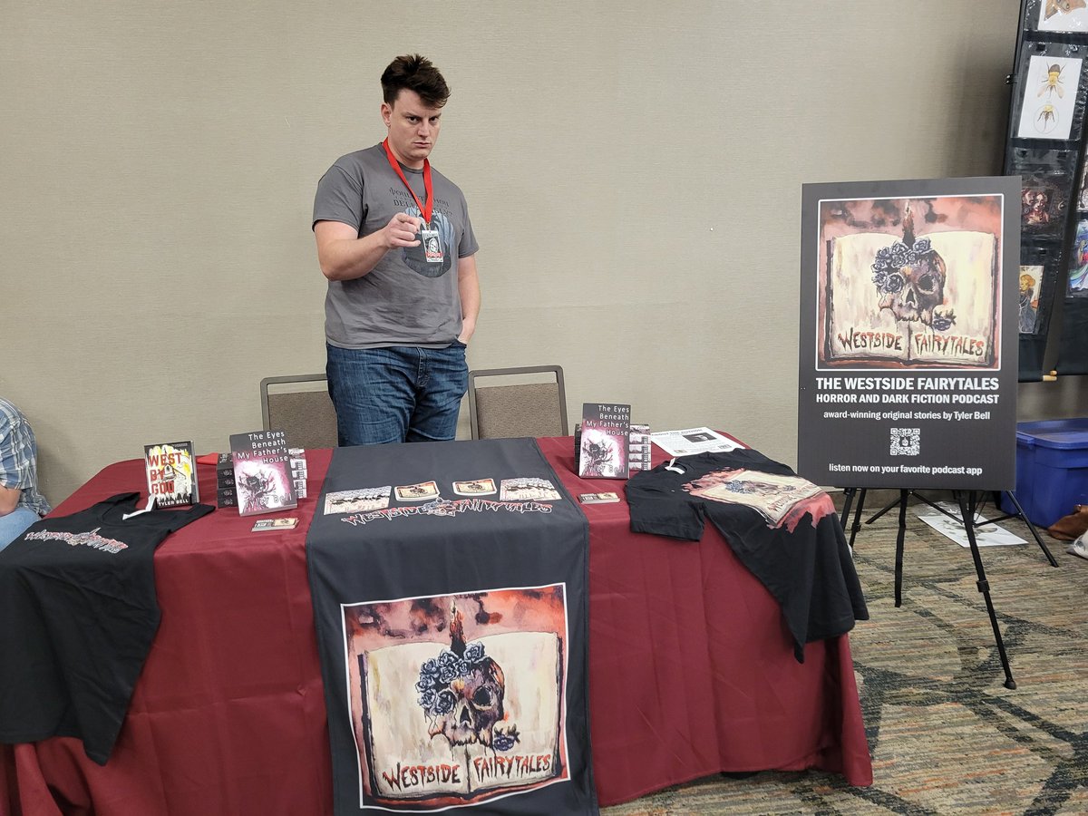 WSFairytales's tweet photo. We're at @VOIDCON2023 in Huntington #WV! It's a new #indie #horror #convention in #appalachia! Come get a signed copy of The Eyes Beneath My Father’s House or pre-order West by God before it comes out! #westbygod #westvirginia #books #novel #fiction #storytelling #voidcon #author https://t.co/hBNlyJwtR1