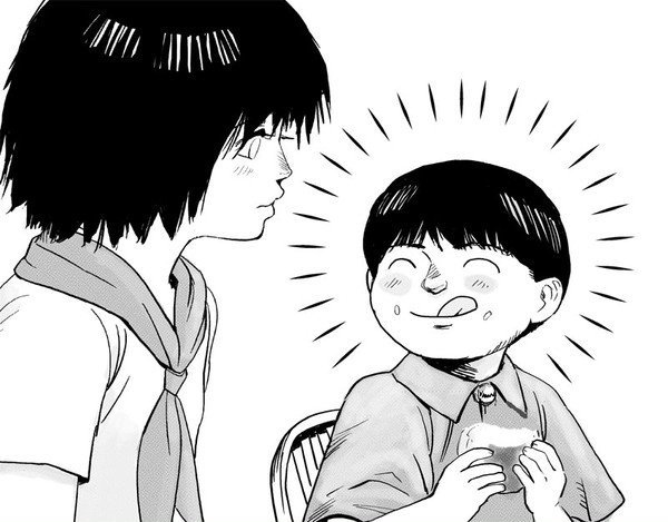 おにぎりをたべるアキラくん