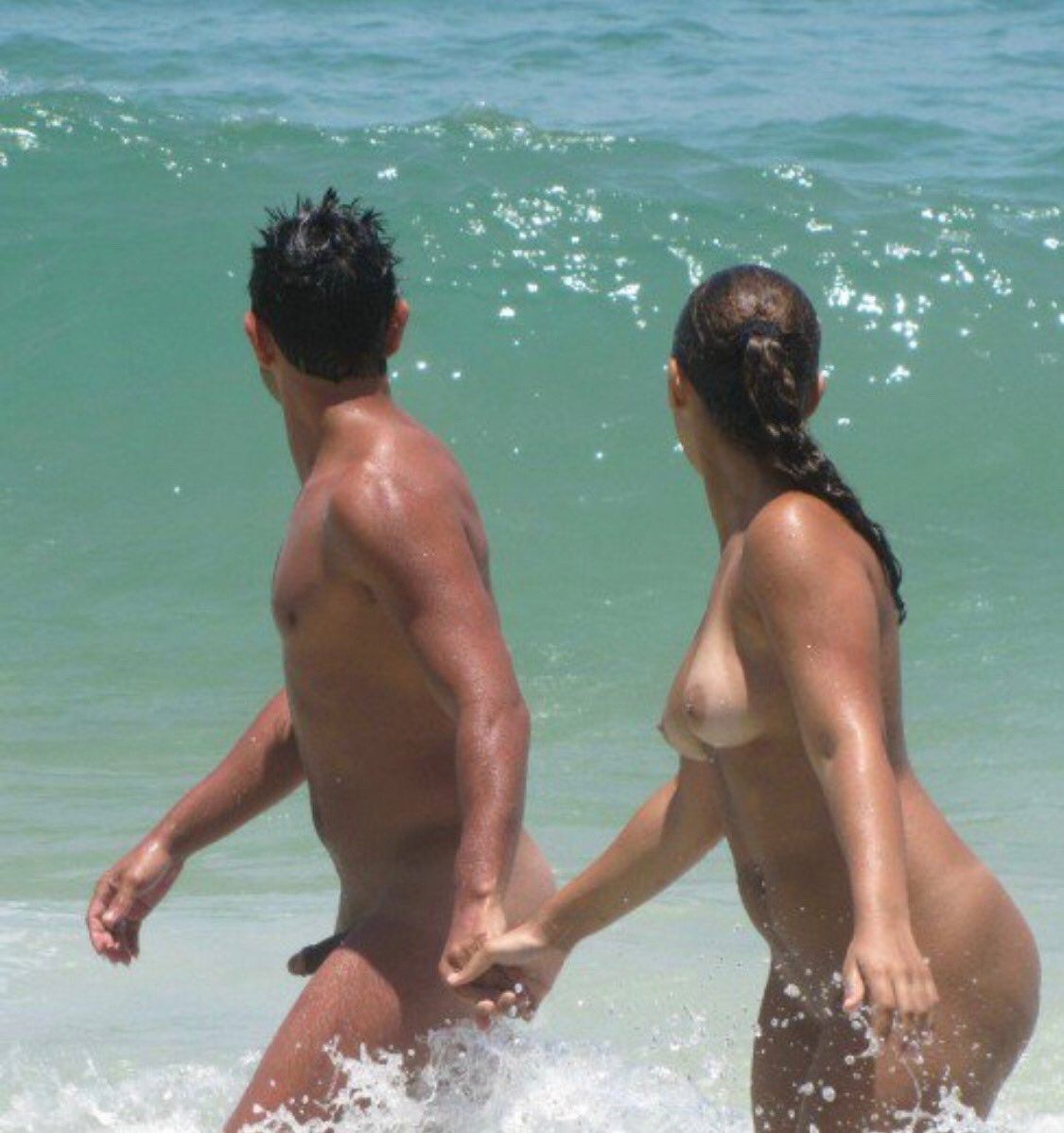 Sexy couple walks on the #nudebeach, looking at the #oceanwaves Share the  Love #nudebeach #nude #naked #nudism #nudistbeach #naturist #naturism # sexycouple