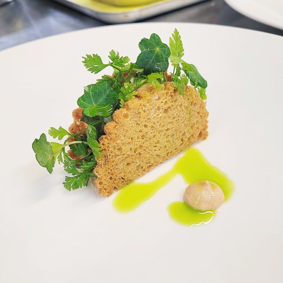 'Crab on toast' / whitby crab / chervil / brioche 

Quick pass shot of our crab on toast. Potted whitby crab, whipped head meat, chervil, nasturtium &amp; mignonette dressing, finished with brioche wafers.
•
#passionate #brigade #foodie #textures #flavours #cookery #chefslife #pass
