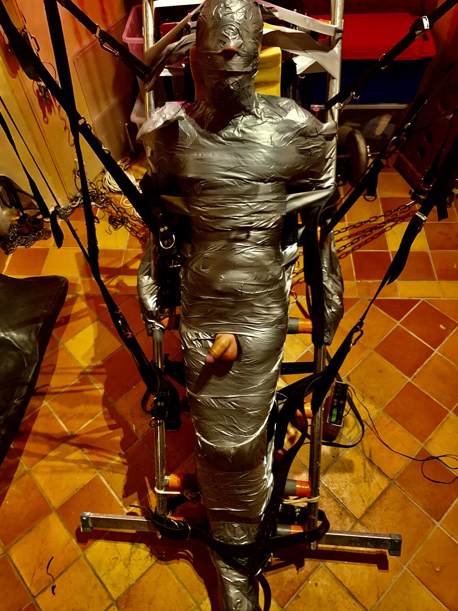 dgbastide's tweet photo. Giving the sensation of floating, I improvised a; comfortable, rigid frame, to tightly tape a mummy too!?
Suspended only inches off the ground, it worked!!  By the time I'd finished, with an electric plug pulsing. @prima2191 who enjoys "stupidly tight," drifted who know where? https://t.co/MUSLAlcVNW